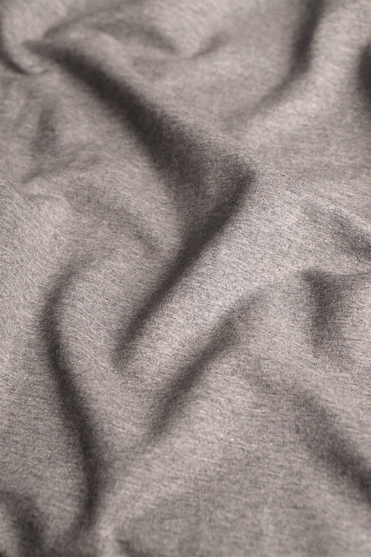 French terry fabric in heather grey, ideal for crafting comfortable loungewear and athleisure