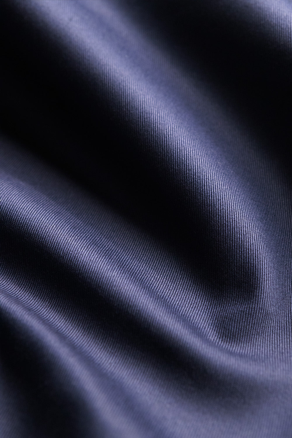 Poly cotton blend fabric in navy blue color - a durable and versatile choice for sewing kits and crafting