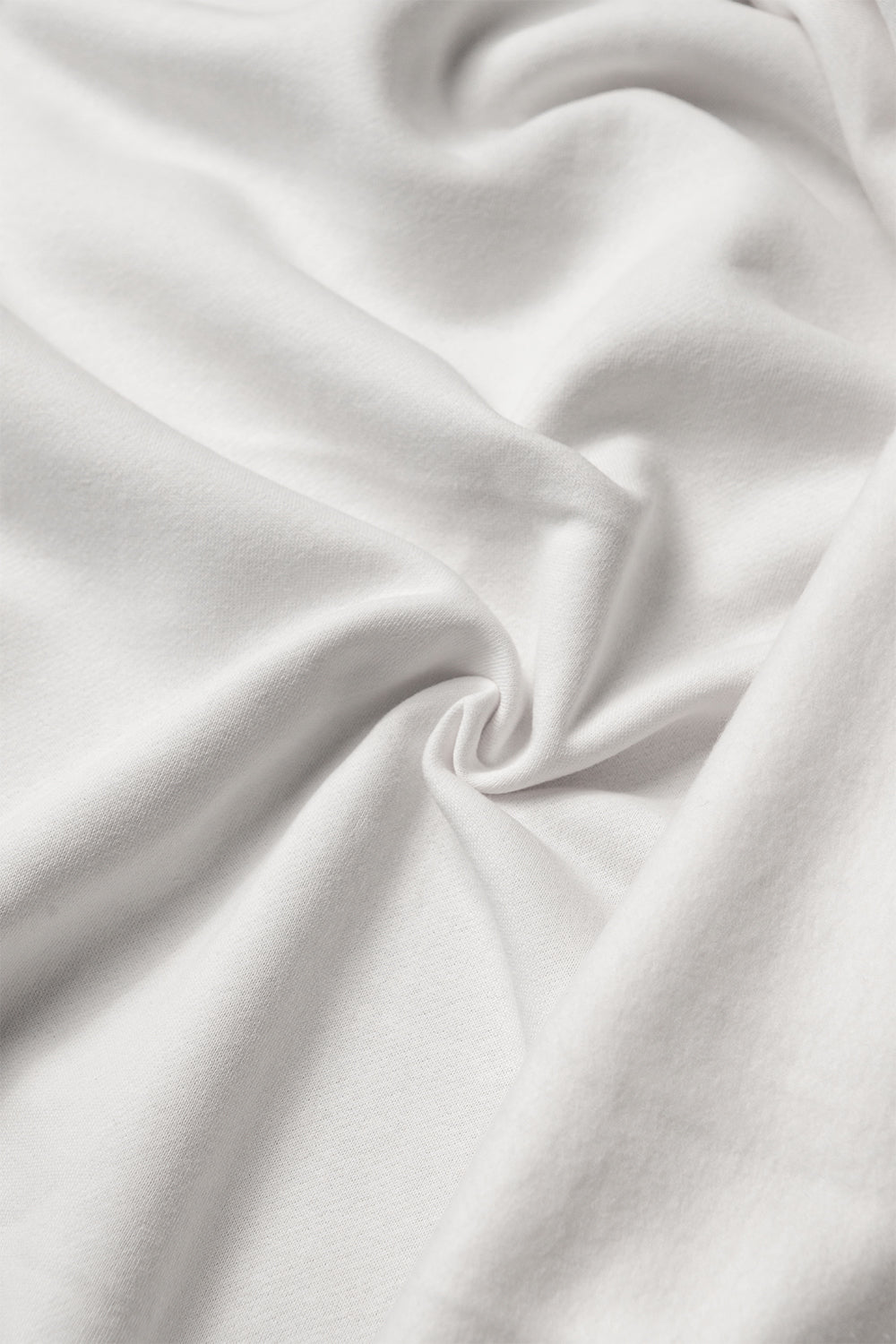 Premium brushed fleece in snow white color - indulge in comfort while you elevate your sewing projects with this versatile fabric